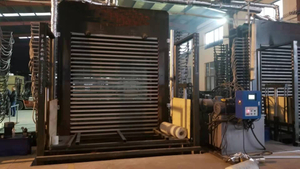 Máquina hidráulica de prensado en caliente de madera contrachapada con carga y descarga semiautomática